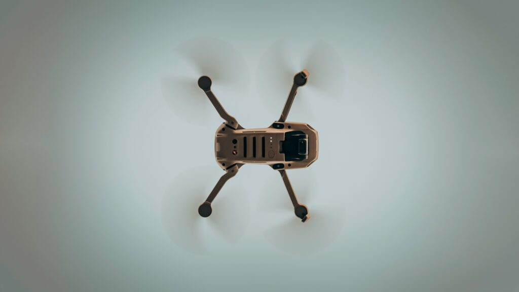 Drone flying over field collecting insect data with smart sensors