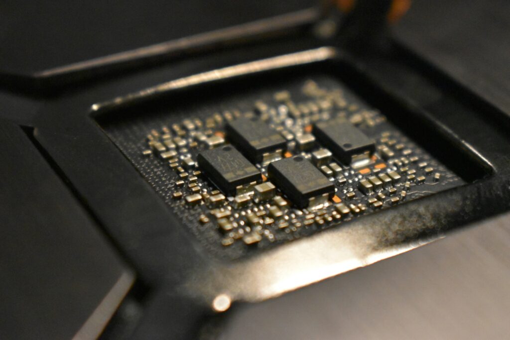 Futuristic computer chip with insect patterns symbolizing neural inspiration