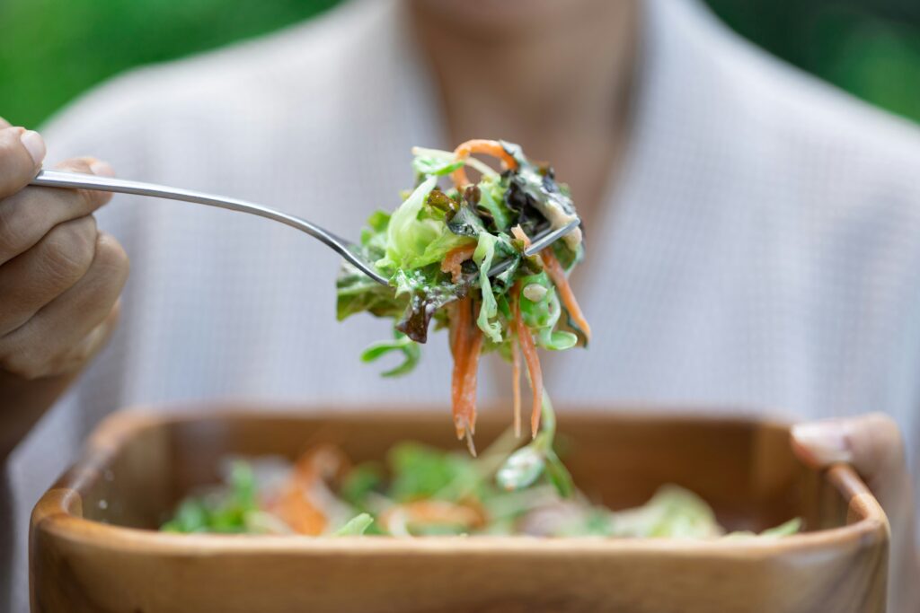 Futuristic dining scene with insect-based foods served as mainstream meals