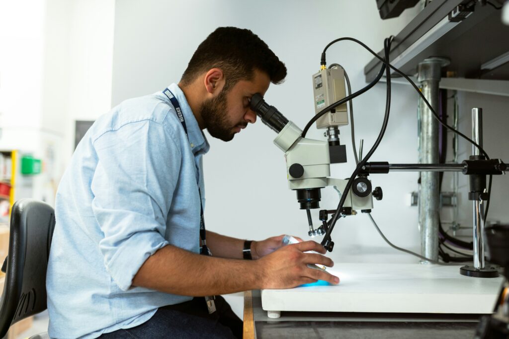 Scientist studying insect venom in a modern laboratory