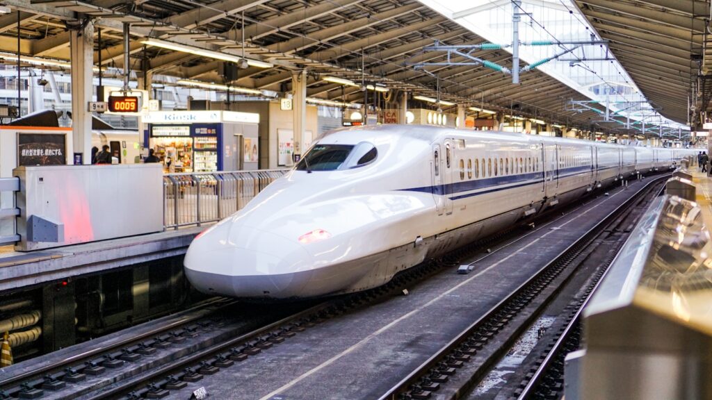 time lapse photography of the Shinkansen bullet train
