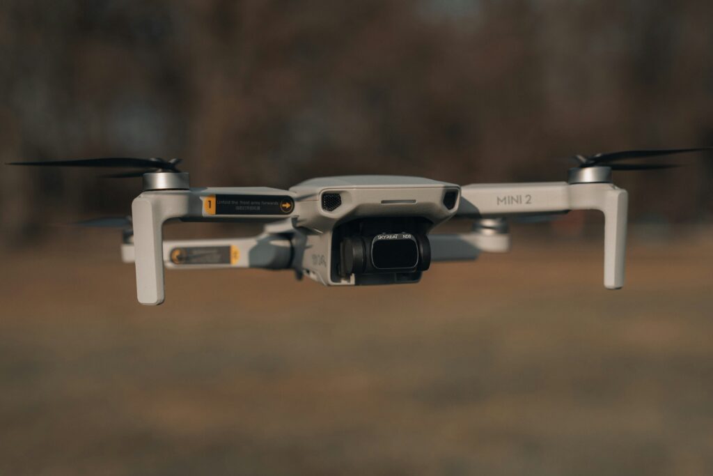 Dragonfly-shaped robotic drone flying indoors with motion blur