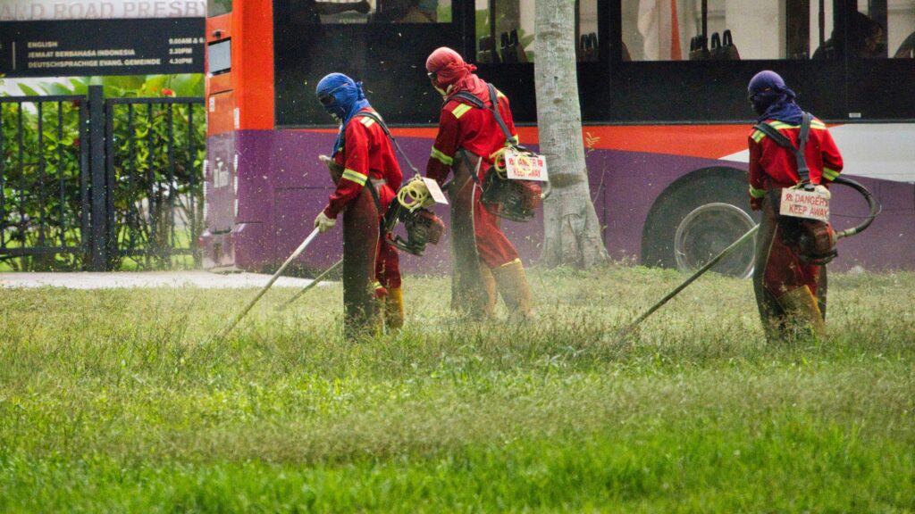 Urban scene with breeding hotspots (gutters, plant trays) and mosquito spraying

