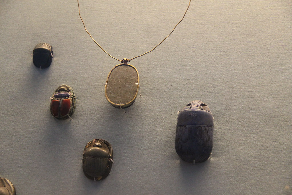 Scarab amulets hung on a wall