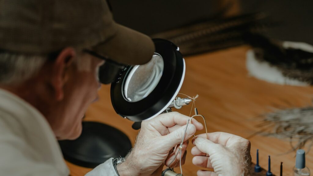 a man working on a piece of art