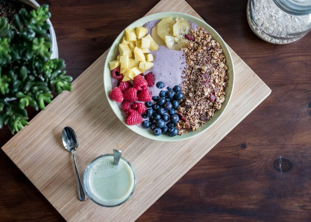 Flat lay photography of fruits on plate