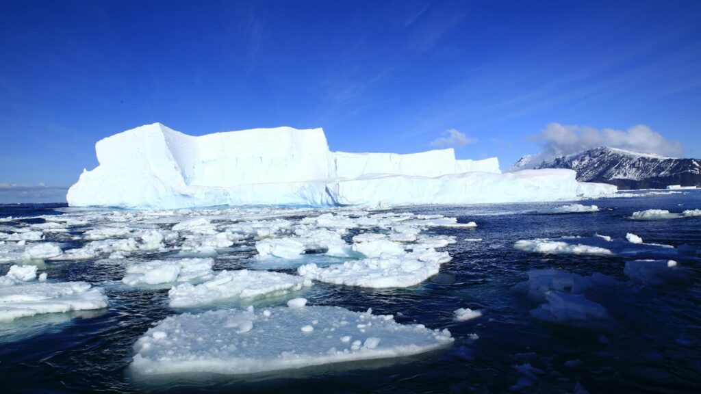 ice berg on body of water